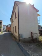 Due case con giardino privato